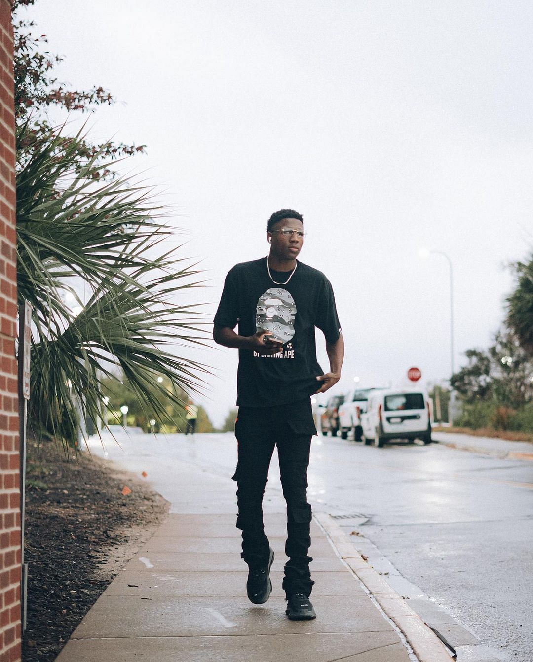 GG Jackson is seen walking down the street. Via Instagram.